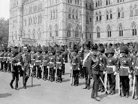 Viscount Willingdon, Governor General of Canada (1926-1931), inspects the Governor General’s Foot Guards, on Parliament Hill.  Date: July 1927. Photographer: Unknown. Reference: Library and Archives Canada, PA-027578.